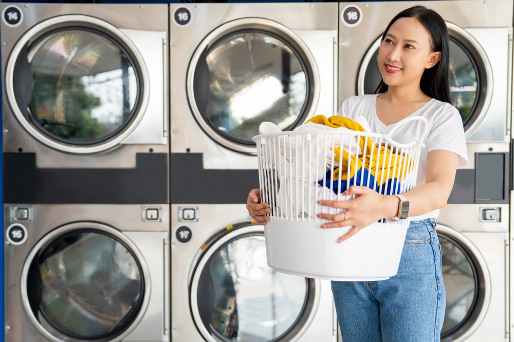 Photo of a Woman Doing Laundry